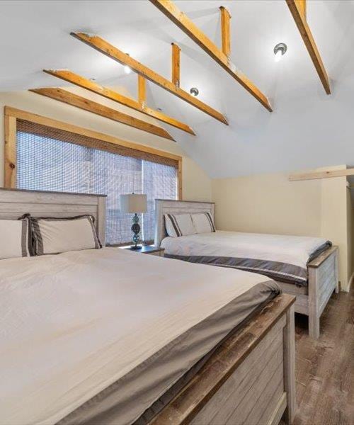 bedroom featuring wood finished floors