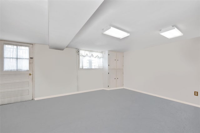 basement featuring baseboards