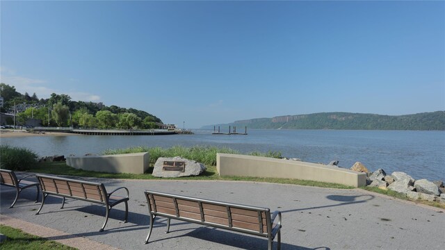 view of property's community featuring a water view