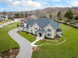 2 Enclave Ct, Dix Hills, NY 11746 - back of house featuring a yard