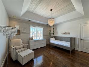 2 Enclave Ct, Dix Hills, NY 11746 - sitting room featuring a raised ceiling, wood finished floors, and wood ceiling
