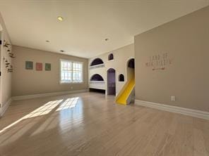 2 Enclave Ct, Dix Hills, NY 11746 - spare room featuring baseboards and wood finished floors