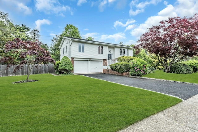 1 Valley Forge Dr, Wheatley Heights, NY 11798 - split foyer home with a garage and driveway
