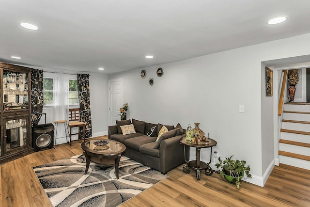 1 Valley Forge Dr, Wheatley Heights, NY 11798 - living room with baseboards, stairs, wood finished floors, and recessed lighting