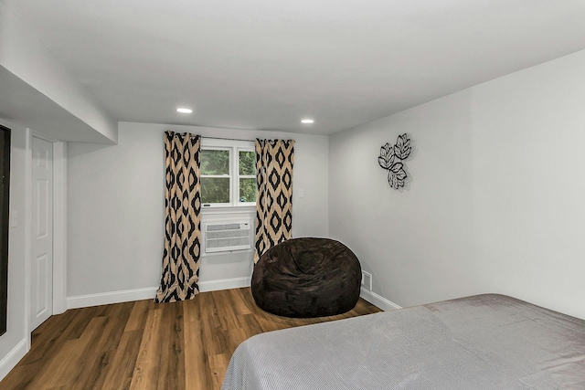 1 Valley Forge Dr, Wheatley Heights, NY 11798 - bedroom featuring wood finished floors, baseboards, cooling unit, and recessed lighting