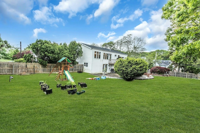 1 Valley Forge Dr, Wheatley Heights, NY 11798 - view of yard featuring a playground and a patio area