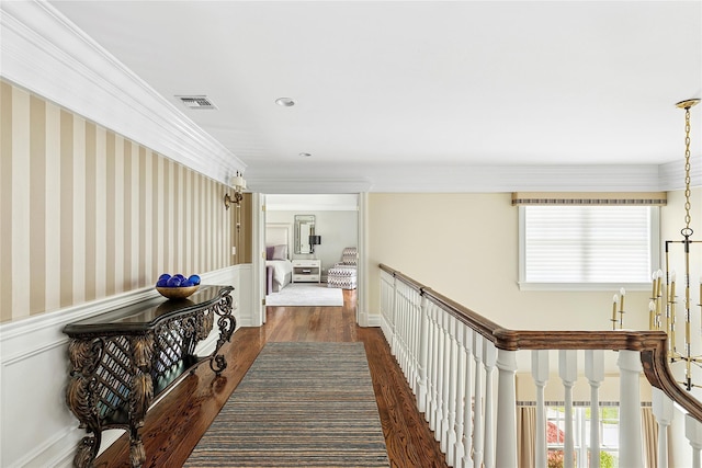 1608 Stewart Ln, Laurel Hollow, NY 11791 - hall with a wainscoted wall, dark wood-type flooring, an upstairs landing, and crown molding