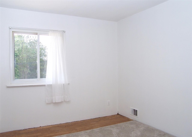 empty room featuring visible vents
