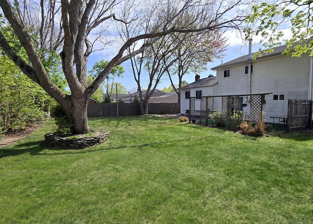 view of yard with fence
