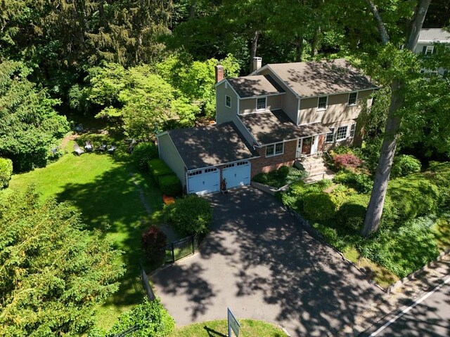 348 Littleworth Ln, Sea Cliff, NY 11579 - view of subject property with a heavily wooded area