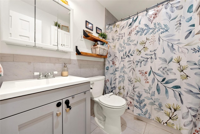 full bath with vanity, tile walls, a shower with curtain, and toilet