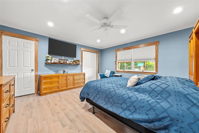 bedroom with crown molding, light wood-type flooring, and recessed lighting