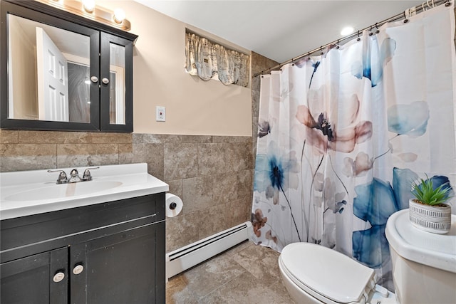 full bath featuring toilet, tile walls, curtained shower, vanity, and a baseboard radiator