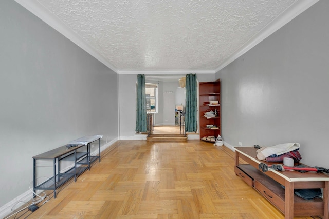 hallway with a textured ceiling, baseboards, and crown molding