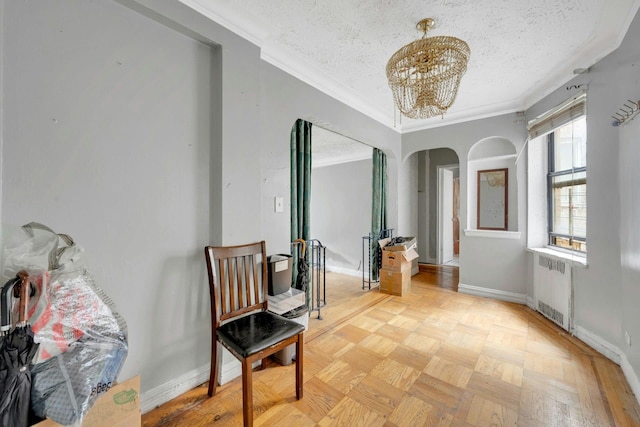 hallway with radiator heating unit, ornamental molding, arched walkways, a chandelier, and a textured ceiling