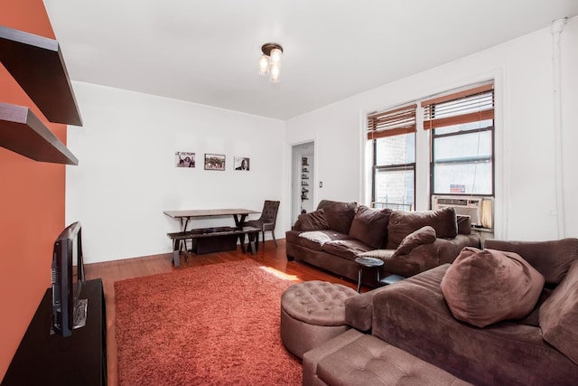 2199 Holland Ave Unit 4D, Bronx, NY 10462 - living room with cooling unit and wood finished floors