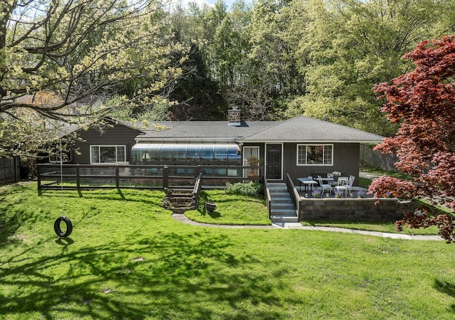 119 W Hunns Lake Rd, Stanfordville, NY 12581 - rear view of property featuring a sunroom, stairway, a wooden deck, and a chimney