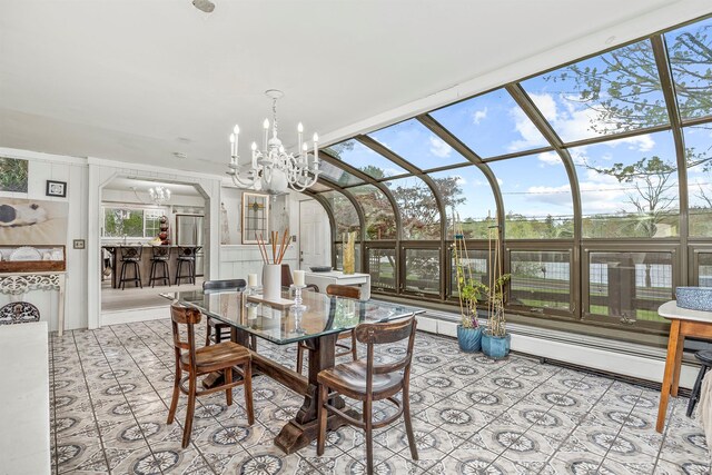 119 W Hunns Lake Rd, Stanfordville, NY 12581 - sunroom with a chandelier, baseboard heating, and arched walkways
