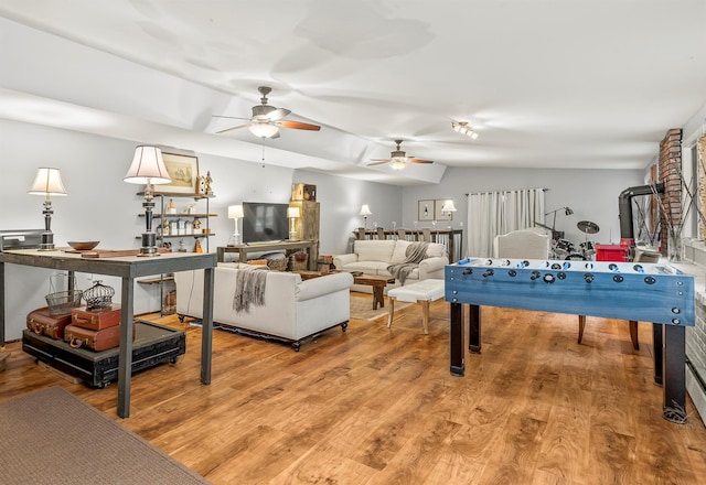 119 W Hunns Lake Rd, Stanfordville, NY 12581 - recreation room featuring light wood-type flooring, a ceiling fan, and vaulted ceiling