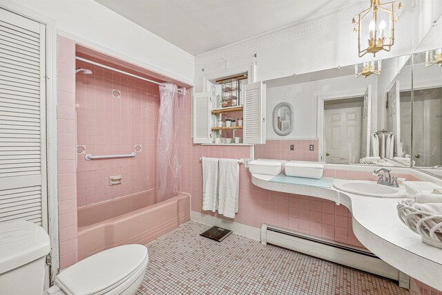 119 W Hunns Lake Rd, Stanfordville, NY 12581 - bathroom featuring a baseboard radiator, toilet, a chandelier, shower / tub combo with curtain, and tile walls