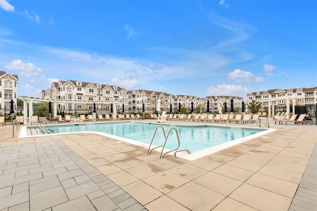 17101 Aspenwood Dr, Plainview, NY 11803 - community pool featuring a pergola, a patio area, and a residential view