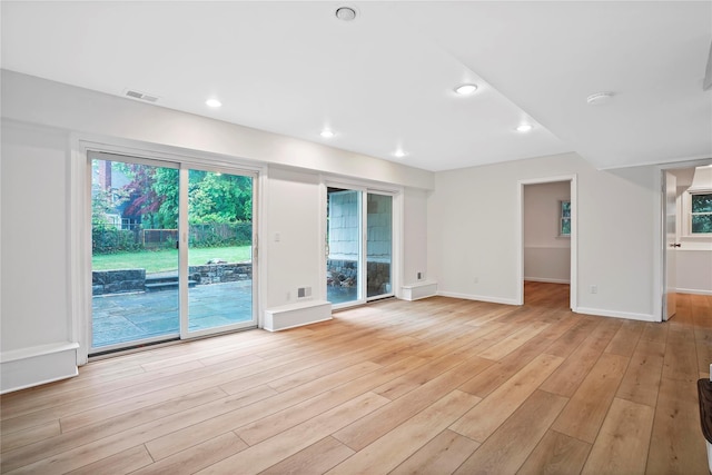 80 Secor Rd, Scarsdale, NY 10583 - unfurnished living room featuring light wood-style flooring, baseboards, and recessed lighting