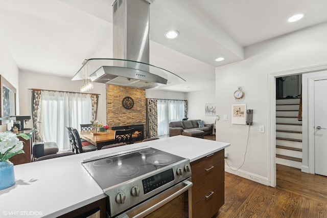 79 Sands Point Rd, Port Washington, NY 11050 - kitchen featuring open floor plan, dark wood-style floors, island range hood, light countertops, and stainless steel electric stove