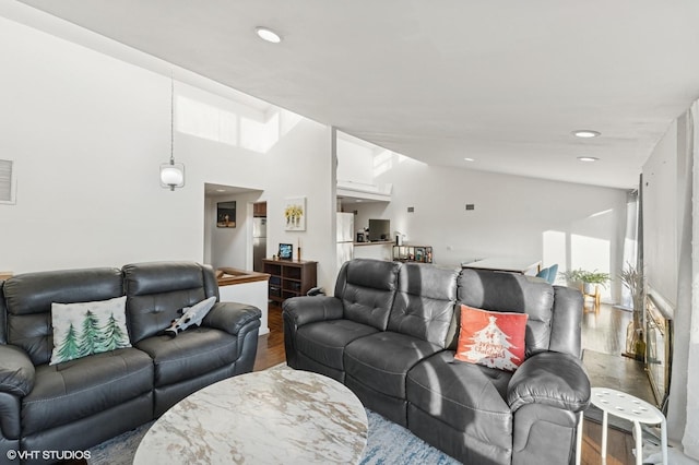 79 Sands Point Rd, Port Washington, NY 11050 - living room featuring recessed lighting, visible vents, wood finished floors, and lofted ceiling