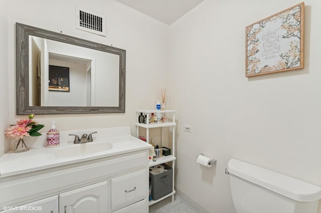 79 Sands Point Rd, Port Washington, NY 11050 - half bath featuring toilet, visible vents, tile patterned flooring, and vanity