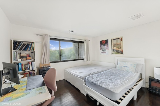79 Sands Point Rd, Port Washington, NY 11050 - bedroom featuring visible vents and wood finished floors