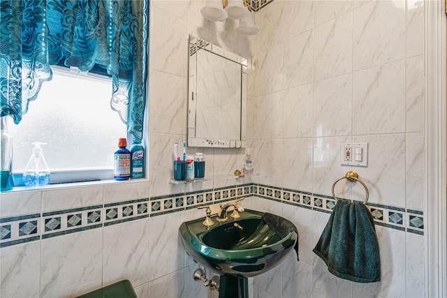 bathroom with a sink and plenty of natural light