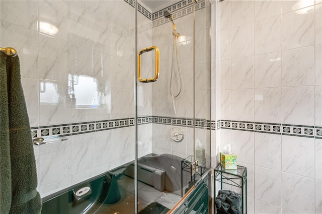 full bath with a baseboard radiator and a stall shower