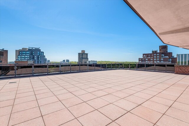 70-20 108th St Unit 15A, Forest Hills, NY 11375 - view of patio / terrace featuring a view of city