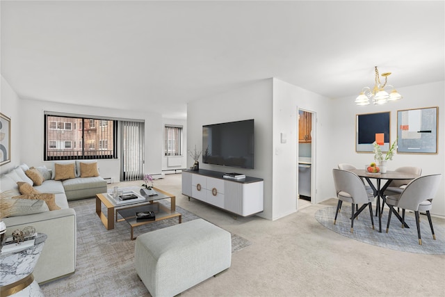 living room featuring light colored carpet, an inviting chandelier, and baseboards