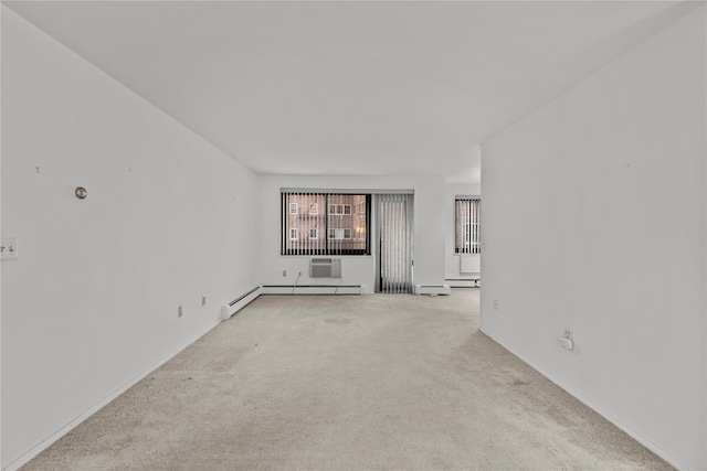 carpeted empty room featuring a baseboard radiator, a wall unit AC, and baseboard heating