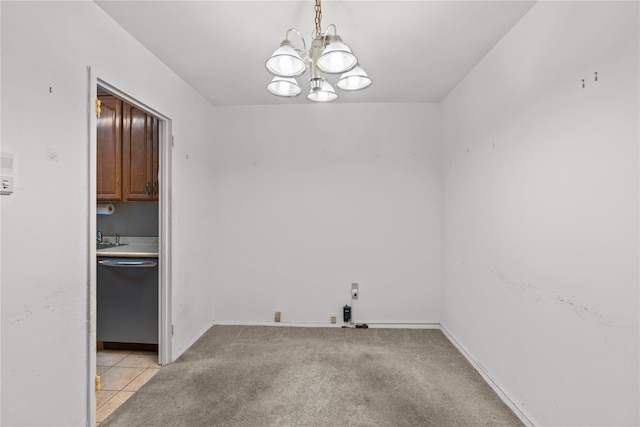 interior space with an inviting chandelier, light carpet, and baseboards