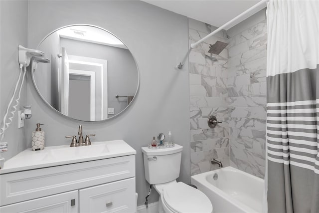full bath with shower / bathtub combination with curtain, vanity, and toilet