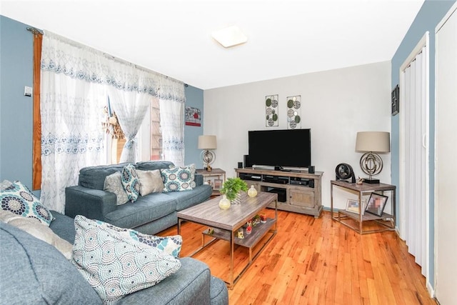 living area with light wood-style flooring