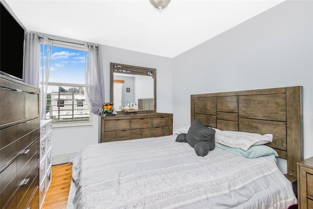 bedroom featuring light wood-type flooring