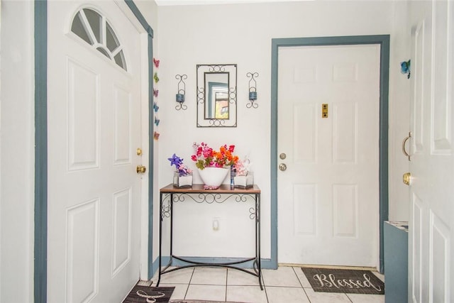 entryway featuring light tile patterned floors