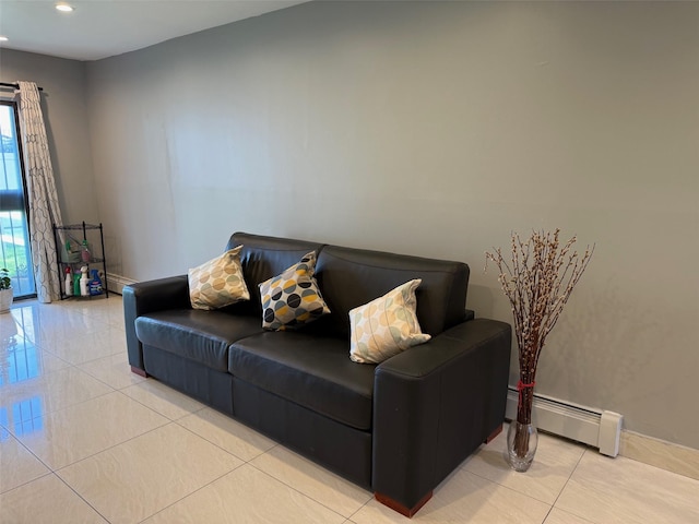 living room featuring light tile patterned floors, a baseboard radiator, recessed lighting, and baseboards