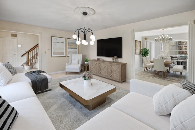 216 Maple Ave, Monroe, NY 10950 - carpeted living room featuring a chandelier, baseboards, and stairway