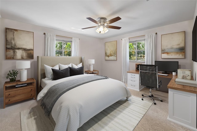 216 Maple Ave, Monroe, NY 10950 - bedroom featuring light carpet, multiple windows, an office area, and ceiling fan