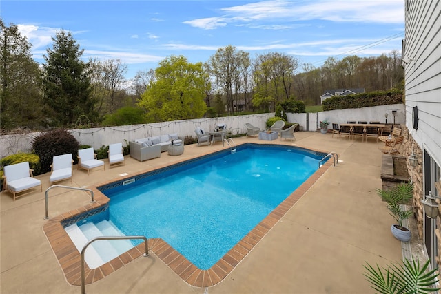 216 Maple Ave, Monroe, NY 10950 - view of swimming pool with an outdoor hangout area, a patio area, and view of wooded area