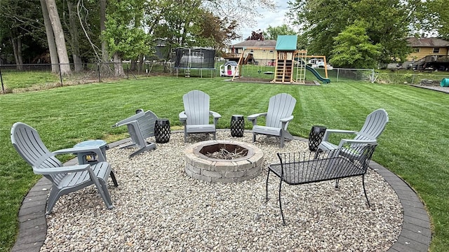 125 Kings Hwy, Congers, NY 10920 - view of patio with a trampoline, a fire pit, and a playground