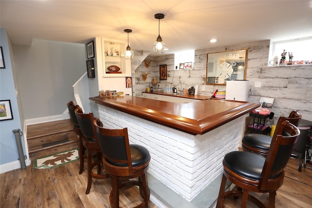 125 Kings Hwy, Congers, NY 10920 - indoor bar featuring wood finished floors, baseboards, and pendant lighting