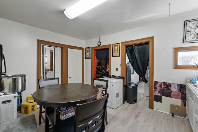 dining room with light wood finished floors