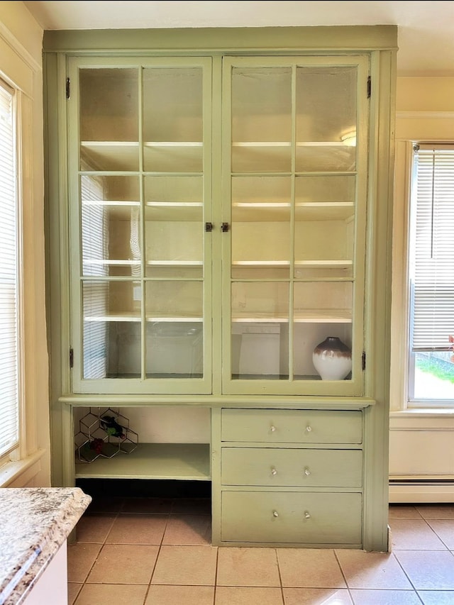 closet with a baseboard heating unit