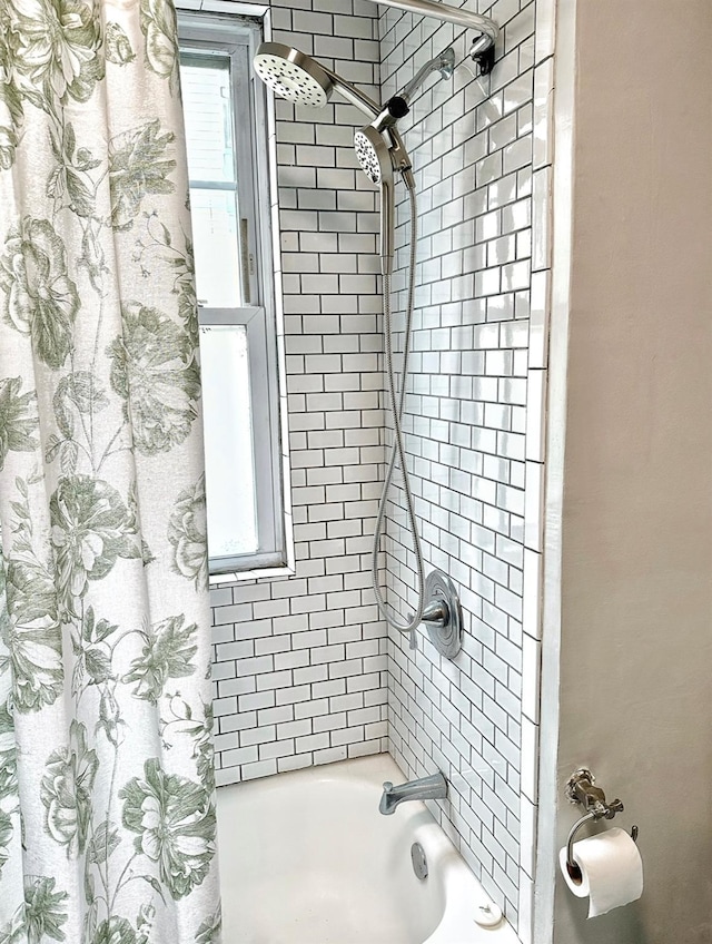 full bathroom featuring shower / bath combination with curtain