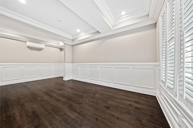 unfurnished room with dark wood-type flooring, crown molding, a wainscoted wall, recessed lighting, and a decorative wall